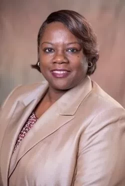 Click to view profile for Theresa Austin-Gibbons